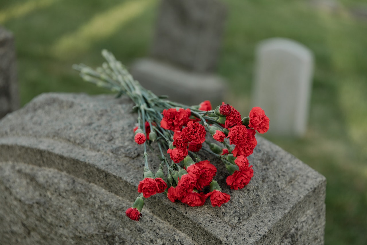 Flowers on a Tombstone
