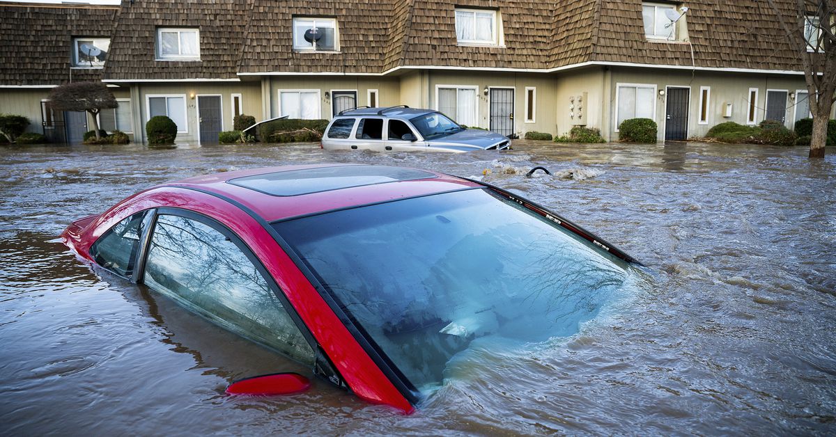A Car Drowned In The Flood Water